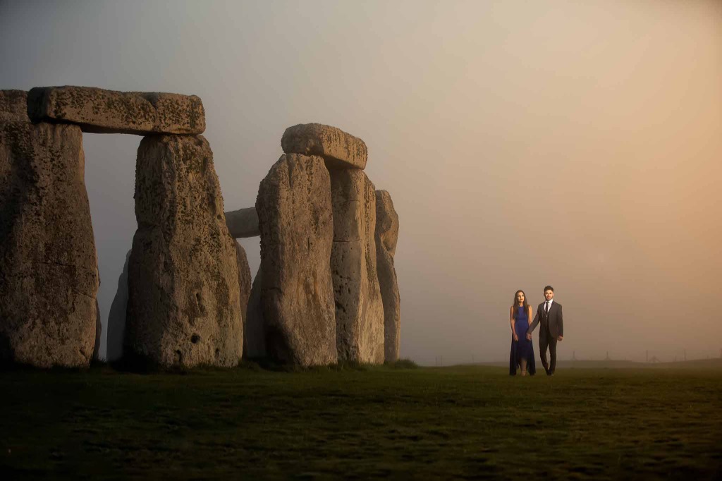 Luxury Asian wedding couple pre-shoot at Stonehenge during golden sunset